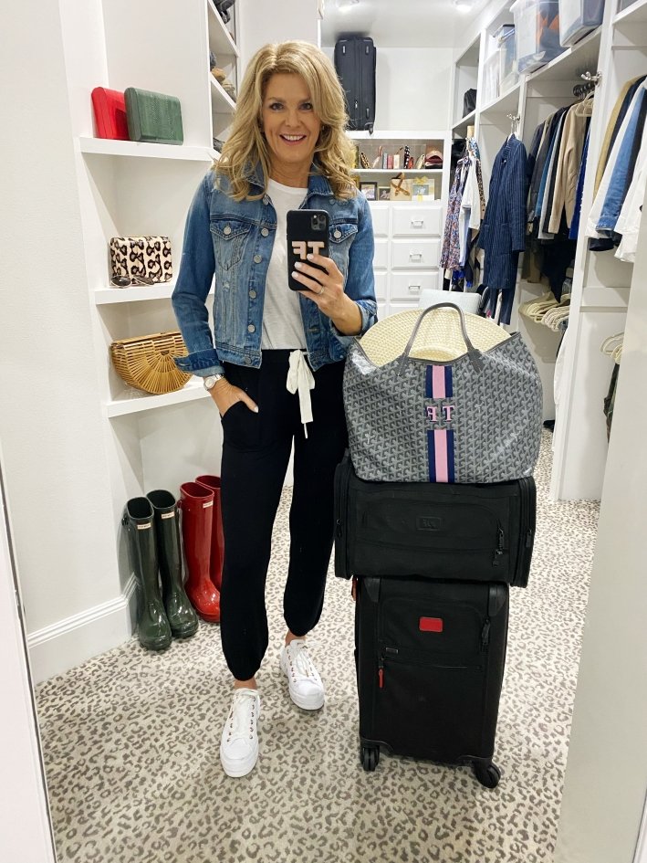 Soma Sunday Pant. white tee, denim jacket with luggage
