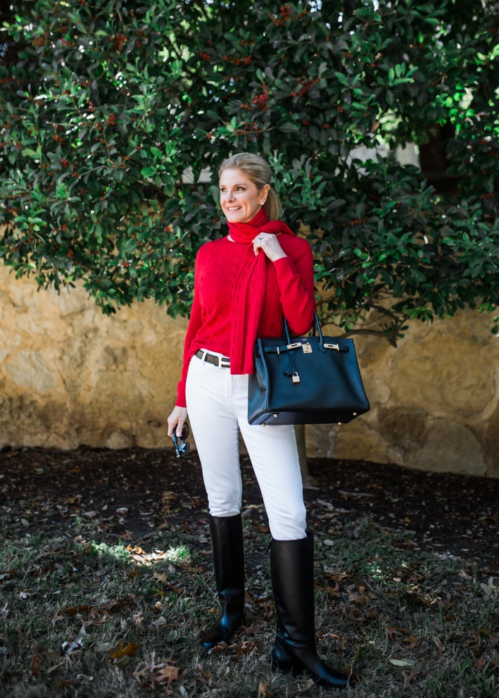 Combining a red cable cashmere sweater from Talbots with white jeans and black Birkin Bag from Hermes for the holidays